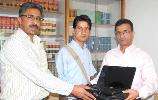 J&K Bank donates laptop to disabled student