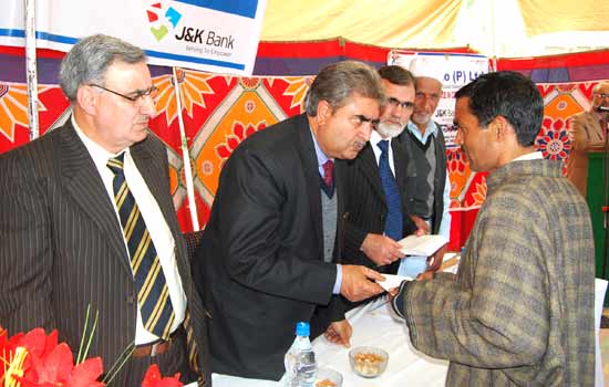 J&K Bank organizes awareness camp at Ompora: Inaugurates new premi…